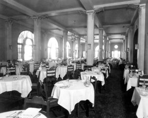 Vintage black and white photo of candle light ballroom early 1900s