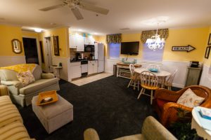 suite open living area with kitchen. beach themed