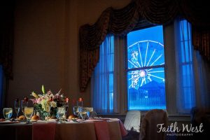 view of the ferris wheel from a window in the candlelight ballroom