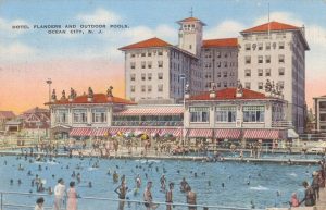 Vintage postcard feature artwork of hotel and salt water pool