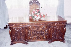 Vintage photo of ornate wooden cabinet