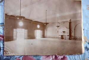 Vintage black and white photo of crystal ballroom, empty