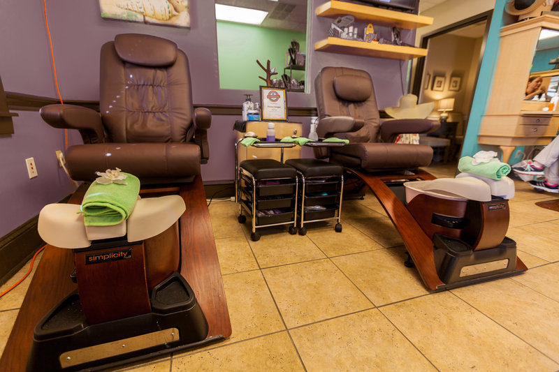 Interior of Divine Images Salon and Day Spa. Pedicure chairs.