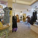 The Shoppes at The Flanders; mannequins in coats and dressware