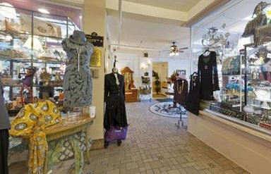 The Shoppes at The Flanders; mannequins in coats and dressware