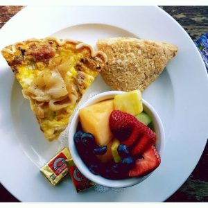quiche lorraine with fruit and scone