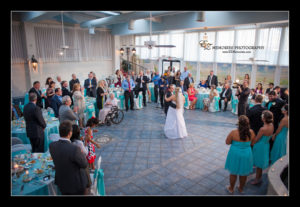 bride and groom first dance in garden room