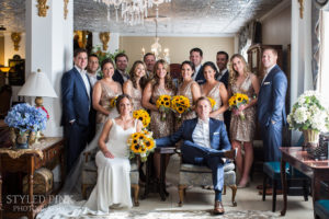 wedding party posing in lobby