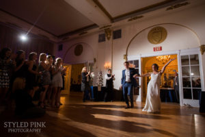 bride and groom arriving in the crystal ballroom