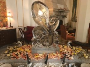 Ice sculpture of octopus, surrounded by cold shellfish spread